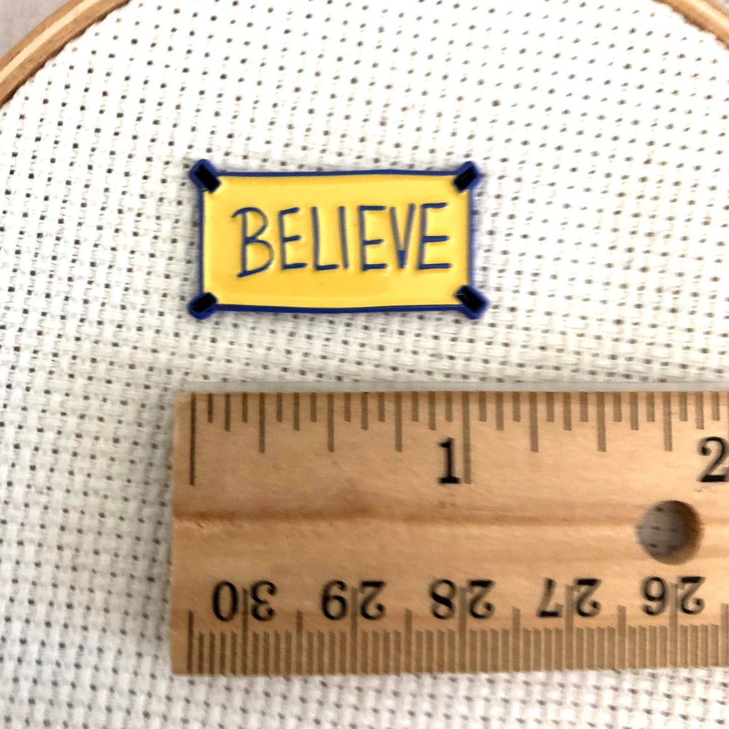 "Believe" Poster Needle Minder